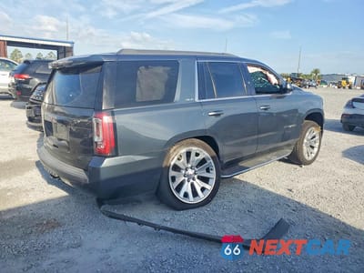 Trzecie zdjęcie samochodu z tyłu: 2020 GMC YUKON SLE VIN:1GKS2AKC1LR114934 - miniatura