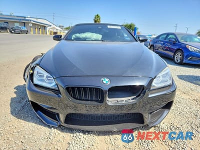 Piąte zdjęcie samochodu w środku: 2015 BMW M6 VIN:WBSLZ9C5XFD651483 - miniatura
