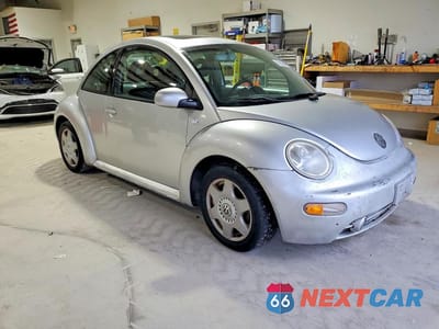 Czwarte zdjęcie samochodu z boku: 2001 VOLKSWAGEN NEW BEETLE GLS VIN:3VWCK21C71M423052 - miniatura
