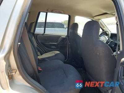 Zdjęcie 11 z 13 samochodu: 2004 JEEP GRAND CHEROKEE LAREDO VIN:1J4GW48S94C269140 - miniatura