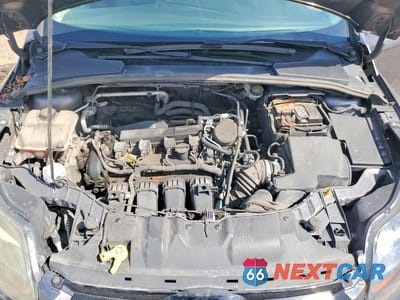 Zdjęcie 11 z 11 samochodu: 2014 FORD FOCUS TITANIUM VIN:1FADP3J21EL116950 - miniatura