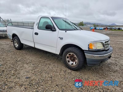 Czwarte zdjęcie samochodu z boku: 2001 FORD F150 VIN:1FTPF17M01KB25596 - miniatura