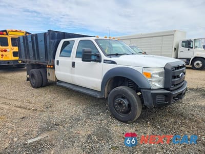 Czwarte zdjęcie samochodu z boku: 2016 FORD F450 SUPER DUTY FLATBED TRUCK VIN:1FD0W4GY7GEB65067 - miniatura