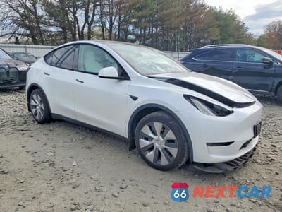 Czwarte zdjęcie samochodu z boku: 2023 TESLA MODEL Y VIN:7SAYGDEE9PA105352 - miniatura