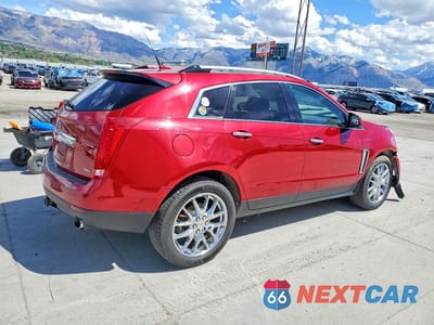 Trzecie zdjęcie samochodu z tyłu: 2014 CADILLAC SRX LUXURY COLLECTION VIN:3GYFNEE32ES679307 - miniatura