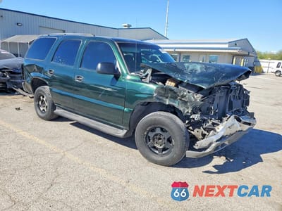 Czwarte zdjęcie samochodu z boku: 2003 CHEVROLET TAHOE C1500 VIN:1GNEC13ZX3J274129 - miniatura