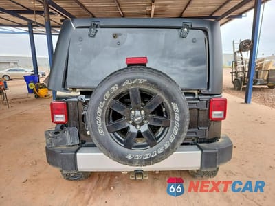 Zdjęcie 6 z 12 samochodu: 2015 JEEP WRANGLER UNLIMITED SAHARA VIN:1C4BJWEG2FL647330 - miniatura