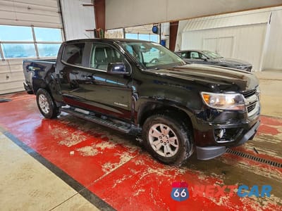 Czwarte zdjęcie samochodu z boku: 2019 CHEVROLET COLORADO LT VIN:1GCGTCENXK1306504 - miniatura