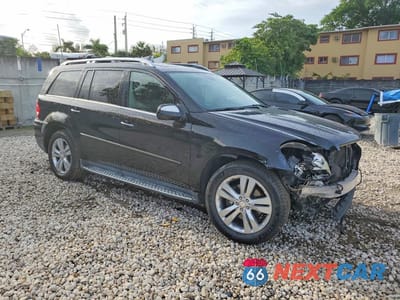 Czwarte zdjęcie samochodu z boku: 2010 MERCEDES-BENZ GL 450 4MATIC VIN:4JGBF7BE9AA610687 - miniatura