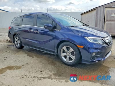 Czwarte zdjęcie samochodu z boku: 2018 HONDA ODYSSEY EXL VIN:5FNRL6H79JB006949 - miniatura