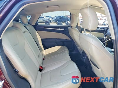 Zdjęcie 10 z 12 samochodu: 2017 FORD FUSION TITANIUM PHEV VIN:3FA6P0SUXHR275799 - miniatura