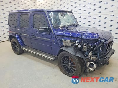 Czwarte zdjęcie samochodu z boku: 2021 MERCEDES-BENZ G 550 VIN:W1NYC6BJ1MX388400 - miniatura