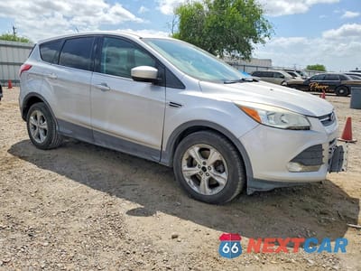 Czwarte zdjęcie samochodu z boku: 2014 FORD ESCAPE SE VIN:1FMCU9GX4EUD55502 - miniatura
