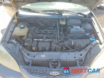 Zdjęcie 11 z 13 samochodu: 2006 FORD FOCUS ZX3 VIN:1FAHP31N86W201876 - miniatura