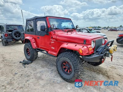 Czwarte zdjęcie samochodu z boku: 1999 JEEP WRANGLER / TJ SPORT VIN:1J4FY19S5XP482585 - miniatura