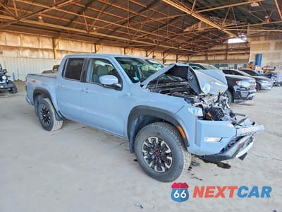 Czwarte zdjęcie samochodu z boku: 2024 NISSAN FRONTIER PRO-4X VIN:1N6ED1EKXRN663860 - miniatura