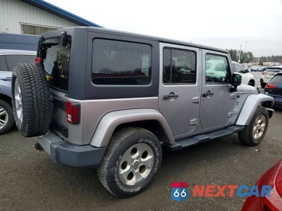 Trzecie zdjęcie samochodu z tyłu: 2013 JEEP WRANGLER UNLIMITED SAHARA VIN:1C4HJWEG8DL571605 - miniatura