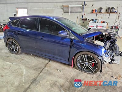 Czwarte zdjęcie samochodu z boku: 2017 FORD FOCUS ST VIN:1FADP3L93HL236182 - miniatura