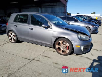 Czwarte zdjęcie samochodu z boku: 2010 VOLKSWAGEN GTI VIN:WVWGD7AJ0AW271013 - miniatura