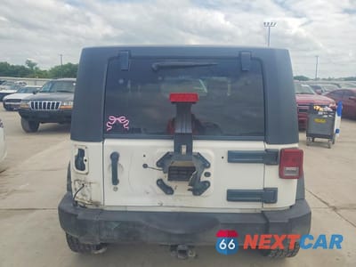 Zdjęcie 6 z 12 samochodu: 2010 JEEP WRANGLER SPORT VIN:1J4AA2D12AL136222 - miniatura