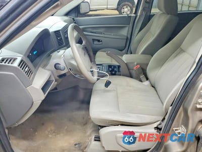 Zdjęcie 7 z 13 samochodu: 2005 JEEP GRAND CHEROKEE LAREDO VIN:1J4GR48K15C680900 - miniatura