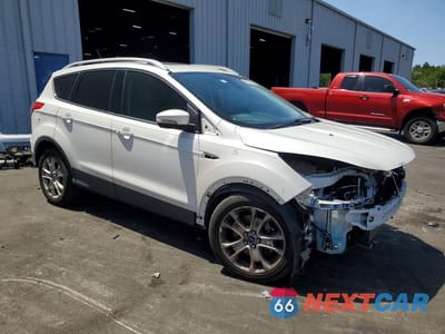 Czwarte zdjęcie samochodu z boku: 2016 FORD ESCAPE TITANIUM VIN:1FMCU0J94GUB52988 - miniatura