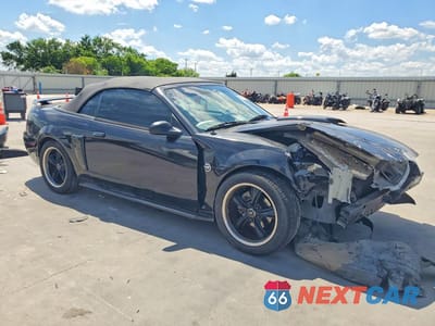 Czwarte zdjęcie samochodu z boku: 2004 FORD MUSTANG GT VIN:1FAFP45X54F150150 - miniatura