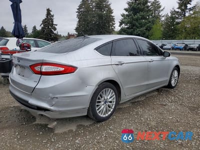 Trzecie zdjęcie samochodu z tyłu: 2016 FORD FUSION SE VIN:3FA6P0H70GR119612 - miniatura