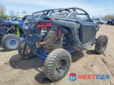 Czwarte zdjęcie samochodu z boku: 2022 POLARIS RZR PRO XP UTILITY VEHICLE VIN:3NSMAD927NF347004 - miniatura