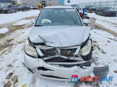 Piąte zdjęcie samochodu w środku: 2011 SUZUKI SX4 LE VIN:JS2YC5A2XB6300108 - miniatura