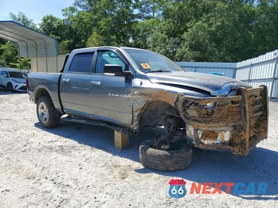 Czwarte zdjęcie samochodu z boku: 2012 DODGE RAM 1500 SLT VIN:1C6RD6LT8CS281422 - miniatura