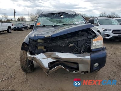 Piąte zdjęcie samochodu w środku: 2011 NISSAN TITAN SV VIN:1N6AA0CC0BN323216 - miniatura