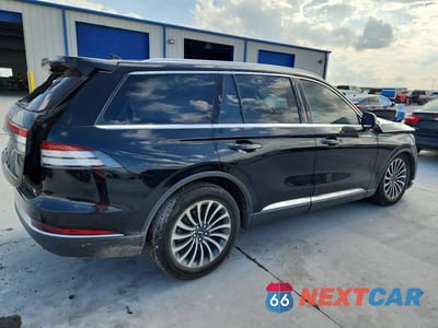 Trzecie zdjęcie samochodu z tyłu: 2020 LINCOLN AVIATOR RESERVE VIN:5LM5J7WC8LGL24881 - miniatura