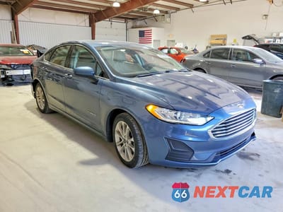 Czwarte zdjęcie samochodu z boku: 2019 FORD FUSION SE VIN:3FA6P0LU3KR101322 - miniatura