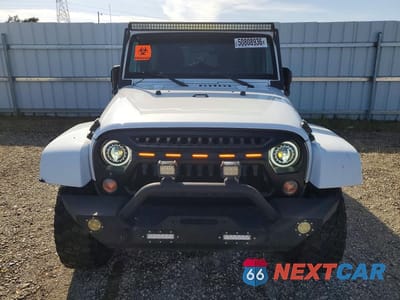 Piąte zdjęcie samochodu w środku: 2018 JEEP WRANGLER UNLIMITED SPORT VIN:1C4BJWDG4JL910380 - miniatura