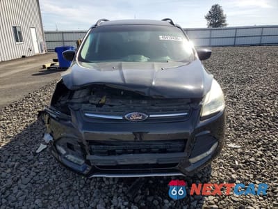 Piąte zdjęcie samochodu w środku: 2016 FORD ESCAPE SE VIN:1FMCU9G99GUC00433 - miniatura