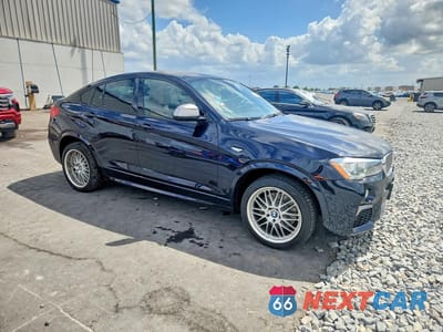 Czwarte zdjęcie samochodu z boku: 2017 BMW X4 XDRIVEM40I VIN:5UXXW7C34H0U26697 - miniatura