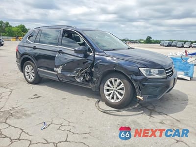 Czwarte zdjęcie samochodu z boku: 2018 VOLKSWAGEN TIGUAN SE VIN:3VV2B7AX1JM155146 - miniatura