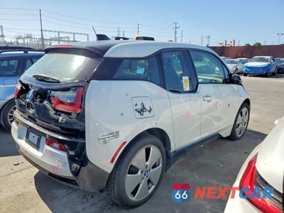Trzecie zdjęcie samochodu z tyłu: 2016 BMW I3 VIN:WBY1Z2C59GV556879 - miniatura