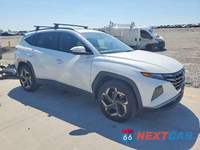 Czwarte zdjęcie samochodu z boku: 2023 HYUNDAI TUCSON SEL VIN:5NMJFCAE6PH186314 - miniatura