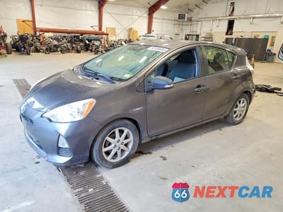 2013 TOYOTA PRIUS C THREE JTDKDTB39D1031947 - główne zdjęcie licytacji z USA - miniatura