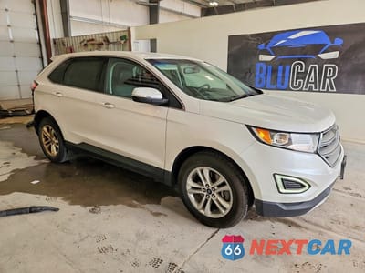 Czwarte zdjęcie samochodu z boku: 2016 FORD EDGE SEL VIN:2FMPK4J94GBC37110 - miniatura