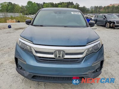 Piąte zdjęcie samochodu w środku: 2019 HONDA PILOT LX VIN:5FNYF5H1XKB027268 - miniatura