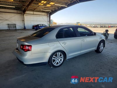 Trzecie zdjęcie samochodu z tyłu: 2010 VOLKSWAGEN JETTA LIMITED VIN:3VWAZ7AJ2AM080052 - miniatura