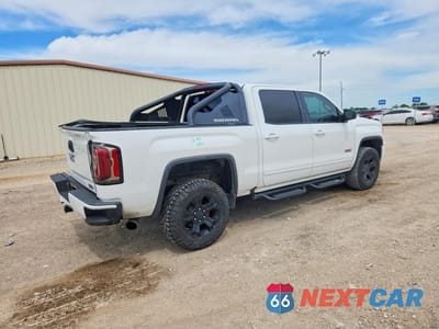 Trzecie zdjęcie samochodu z tyłu: 2016 GMC SIERRA K1500 SLT VIN:3GTU2NEC6GG348516 - miniatura