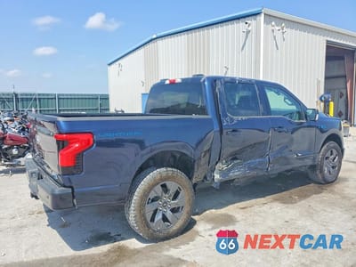 Trzecie zdjęcie samochodu z tyłu: 2024 FORD F150 LIGHTNING XLT VIN:1FTVW3L72RWG23113 - miniatura