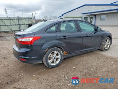 Trzecie zdjęcie samochodu z tyłu: 2014 FORD FOCUS SE VIN:1FADP3F25EL424793 - miniatura