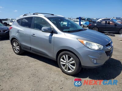 Czwarte zdjęcie samochodu z boku: 2013 HYUNDAI TUCSON LIMITED VIN:KM8JU3AC1DU766588 - miniatura