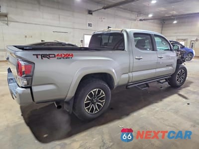 Trzecie zdjęcie samochodu z tyłu: 2023 TOYOTA TACOMA TRD SPORT VIN:3TMDZ5BN2PM153760 - miniatura