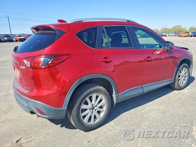 Trzecie zdjęcie samochodu z tyłu: 2014 MAZDA CX-5 TOURING VIN:JM3KE4CY1E0325628 - miniatura